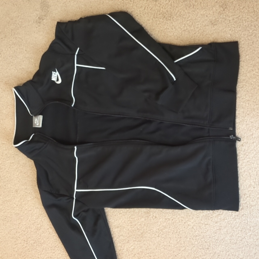Black Nike athletic jacket. Size "L(14-16)" in juniors, aka women's 12